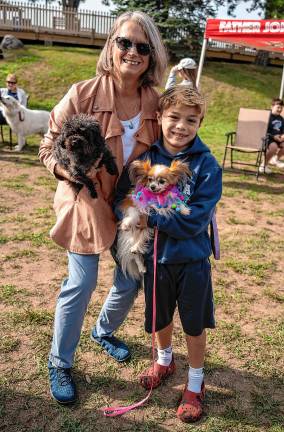 Stacy Herldia with Gemma and Abel Rivas with Lexi.