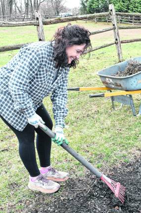 <b>Natalie Buccieri of Vernon works on the soil.</b>