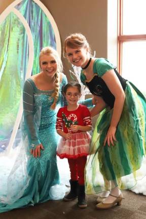 Posing with characters from Frozen at the SEFC Christmas Festival.