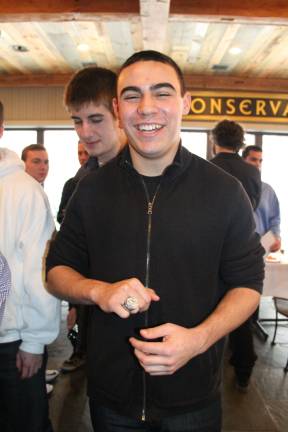 Lucas Faria happy to try on the Giants Superbowl Ring.