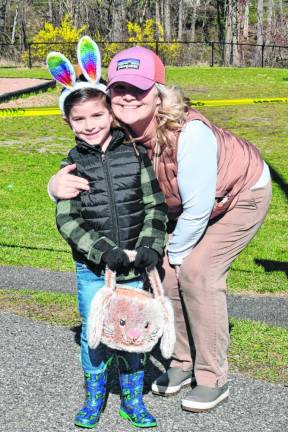 Kristy and Lucas Maloney pose at the Easter egg hunt.