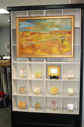 More art from Maggie Davis-Jelly with custom framing from Art Etc in Sparta.