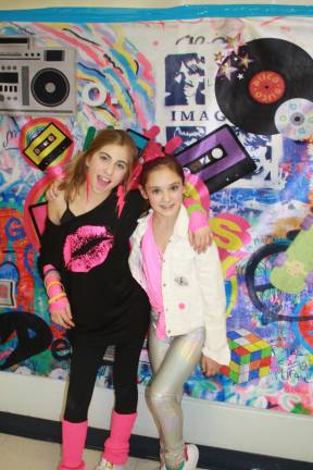 Jenna Flake and Alex Maresca love dressing the part for 80's Night.