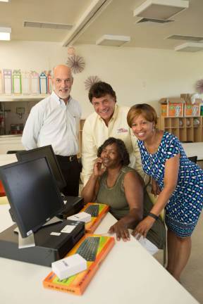 From left, Dr. Bruce Johnson, John Zoetjes, scholarship recipient and nursing student Melissa Smith and Gail Dash, manager of Eggerts Crossing in Lawrenceville, NJ Photos courtesy of JAHMA