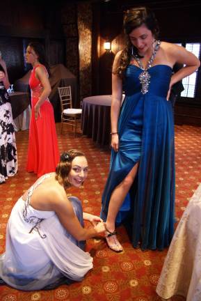 Holly Rudel helps out Breanna Vitolo.