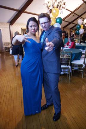 Elise Lee and her escort.