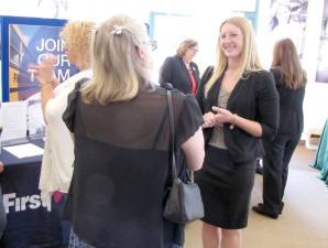 Kyersten Geiger speaks to a Career Fair attendee.