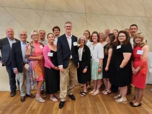 Participants in the Jewish Foundation for the Righteous’s 2023 European Study Program pose with Daniel Lawton, center, deputy chief of mission at the U.S. Embassy in Poland. (Photo provided)