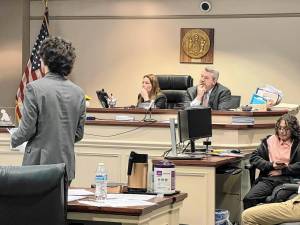 Sussex County Bar Association president Brent Rafuse and secretary Vanessa Henderson judge a preliminary round of the Sussex County High School Mock Trial Competition. (Photos by Travis Nunziato)