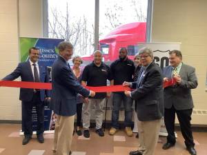 (Back row): Ketan Gandhi, SCCC CFO; Linda Connor, SCCC CDL/CE Coordinator; Juan Lopez, CDL Lead Instructor; Demetrius Robinson, CDL instructor; Kaylee Peterson, 160 Driving Academy Manager; Dr. Dominic Carbone, SCCC Dean of Program Advancement. (Front): Dr. Jon Connolly, SCCC President; William Curcio, SCCC Board Chair.