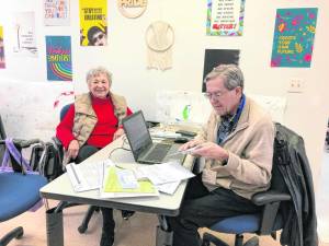 Phil Horjus of Branchville helps a resident file her taxes Thursday, April 4. He has been a volunteer with the Volunteer Income Tax Assistance (VITA) program at Norwescap in Sussex for six years. (Photo by Kathy Shwiff)