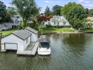 Desirable Lake Mohawk home and boathouse