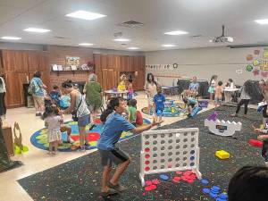 SPL1 Children play games during the kickoff of the Sparta Public Library’s Summer Reading Program on Monday, June 23. (Photo by Dave Costa)