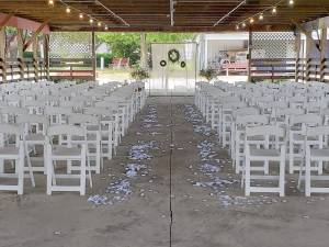 “It’s a crazy time for all these brides”: Sue-Ann Hansen, event coordinator, said the Fairgrounds Conservatory offers tent and barn options for weddings on short notice.
