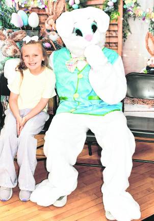 Reagan Clanton of Sparta poses with the Easter Bunny.