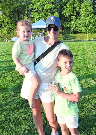 Remy, Julian and Calvin Malits pose for a photo.