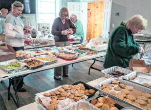 Tables full of cookies are shown.