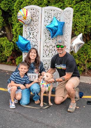 The Graw family with Pancake, a lab mix and winner in the All American dog category.