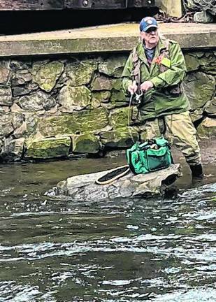 FI2 Billy Rude has a sizable trout on his line. (Photo by Bill Truran)