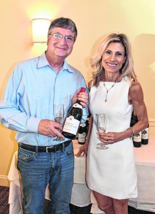 Mark Lind of Burke's Wine and Liquors is shown with presenter Nicole Borrelli.
