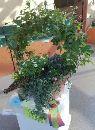 The Best in Show for Professional Floral Arrangers went to Richard Kawaske of Fair Acres, for his interpretation of the theme "Dutch Canal Boat".