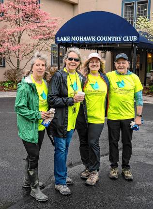 Cleanup volunteers Susie Botwick, Susan Knauss, Sue Kvanali and Neil Sauerwein.