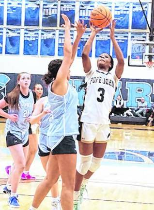 Pope John's Mia Washington (3) jumps during a shot.