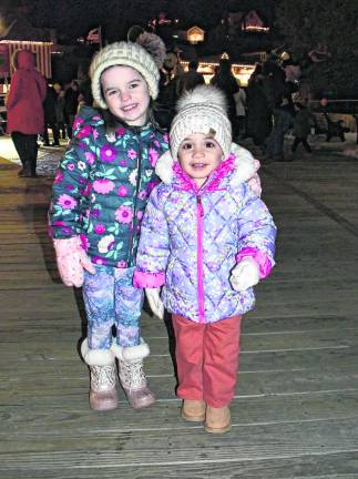 Louise Dicocco and Ellie Certuche of Sparta pose at the tree lighting.