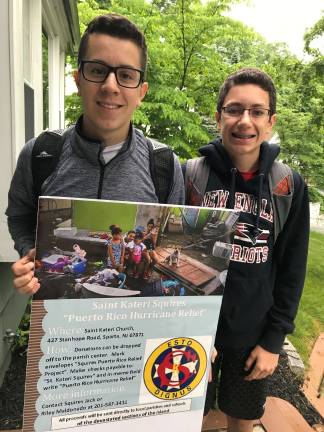 Brothers Jack and Riley Maldonado with their Puerto Rico relief poster Photos provided