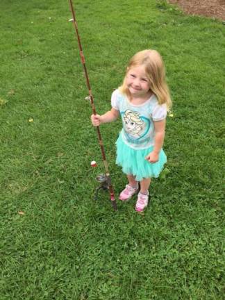 Greenlee Jaust is ready for the Youth Fishing Derby at the Sussex County Farmer's Market. Photo courtesy of 4-H Club