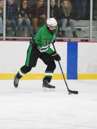 Kinnelon's Jared Fatzer steers the puck in the first period.