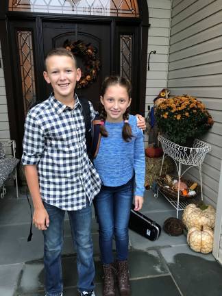 Jake Ryan of The Water Conservation Project with his sister Ella.