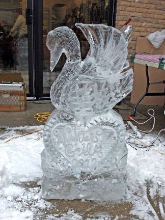 A splash of water adds polish and shine to the sculpture.