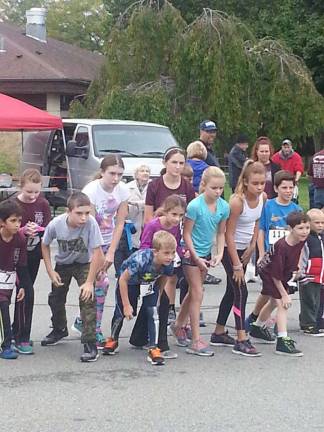 Start of last year's Mile Fun Run Photo by Laurie Gordon
