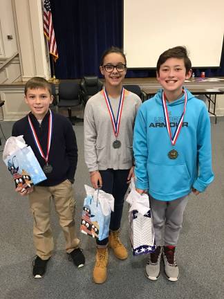 From left, Josh Lipton (2nd place), Samantha Shack (3rd place) and Kai Batchelor (champion) Photos by Laurie Gordon
