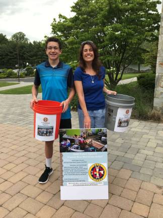 Riley Maldonado and his mom Stacy collecting donations outside Saint Kateri parish