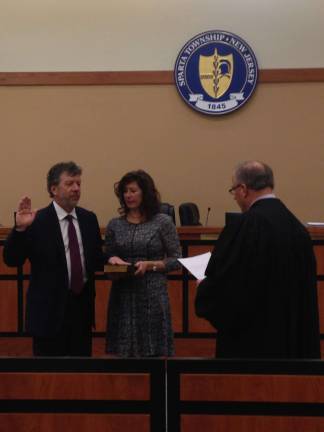 Judge James Farber (ret.) conducts the oath of office for newly appointed Sparta Municipal Court Judge Paris P.Eliades