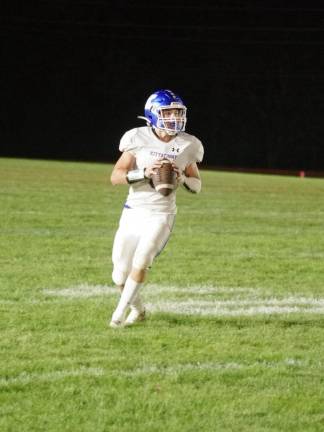 Kevin O'Keefe of Kittatinny looks for an open receiver.