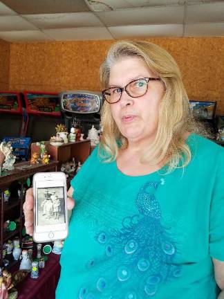 Roxanne Horbatuck of Lake Hopatcong shows off a picture of herself at Wild West City as a child.