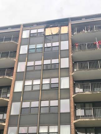 Fire, smoke, and water left about 13 units in a Newton high-rise apartment building uninhabitable on Thursday, Dec. 12, 2018, according to Newton Police. (Photo by Laurie Gordon).