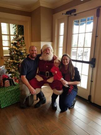 The Woolley Family with Santa Photo courtesy of the JWCS