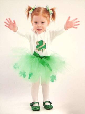 McKenna was born 4 hours shy of St. Patrick's Day, but has that Irish red hair and the spunk of a leprechaun! Photo courtesy of Lindsay