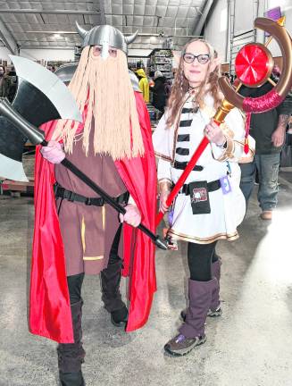 <b>Jeff and Kate Holick of Parsippany dress in costume.</b>