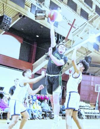 Veritas Christian's Aiden Bennett goes up for a shot.