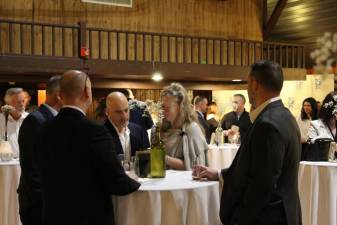 Guests sample the wine at the ninth annual Wine &amp; Food Pairing, which raised funds for the Sparta Education Foundation on March 4. (Photos by Carlos Davidson)