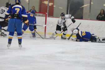 Braydon Sisco (17) of the Kinnelon/Jefferson/Sparta United ice hockey team maneuvers the puck just before he scores the first goal against Cranford High School on Friday, Jan. 26 at Skylands Ice World in Stockholm. The tri-op team won, 6-4. Sisco and Adam Stefancik each scored two goals. (Photos by George Leroy Hunter)