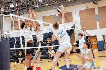 Sparta’s Owen Englehardt (25) gets a hand on the ball in the game against Vernon on Thursday, April 18. The Vikings won 25-14, 25-14. (Photos by George Leroy Hunter)