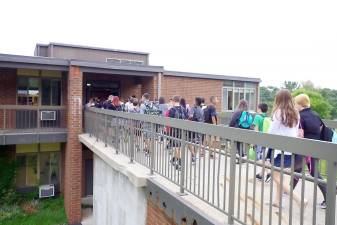 Vernon students file into school in pre-pandemic days (File photo by Chris Wyman)