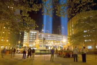 Towers of light mark the Manhattan sky (Photo by Robert G. Breese)