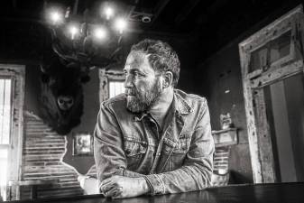 Americana pop/rock singer-songwriter JM Stevens recently released his full-length sophomore album, ‘Nowhere to Land.’ (Photo by Mark Abernathy)